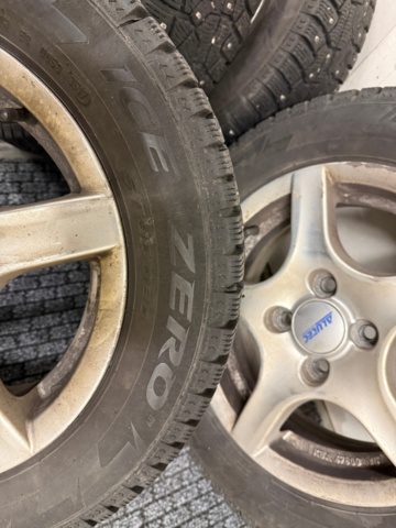 1352446-3 4 Pirelli studded tires on aluminum rims 175/65 4-hole