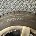 1352446-4 4 Pirelli studded tires on aluminum rims 175/65 4-hole
