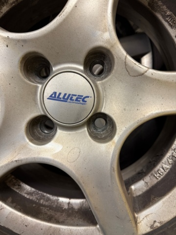 1352446-5 4 Pirelli studded tires on aluminum rims 175/65 4-hole