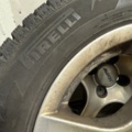 1352446-7 4 Pirelli studded tires on aluminum rims 175/65 4-hole