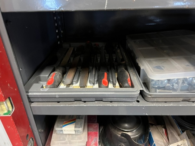 1426801-5 Warehouse shelf with contents