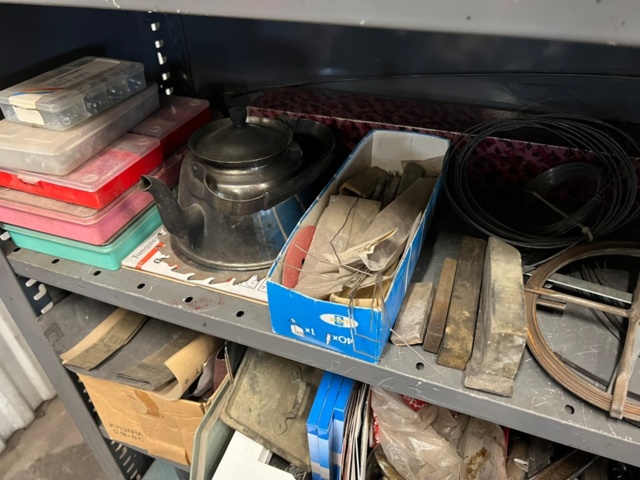 1426801-8 Warehouse shelf with contents