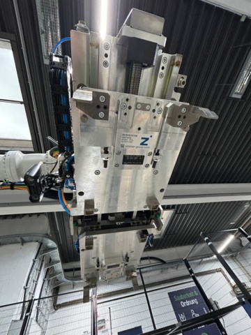 1056746-12 Robotcell för lyft och palläggning av batterimoduler – ABB / Siemens