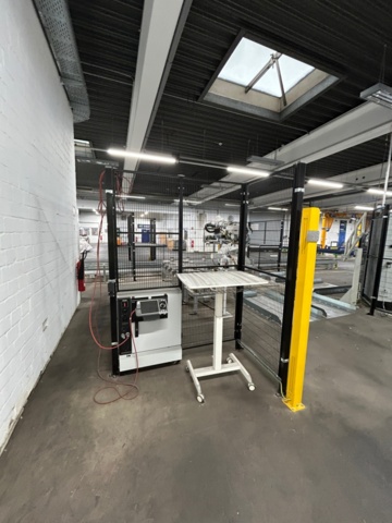 1056746-20 Robotcell för lyft och palläggning av batterimoduler – ABB / Siemens