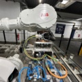 1056746-10 Robotcell för lyft och palläggning av batterimoduler – ABB / Siemens