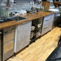 1457457-1 Workbench with two sinks, cabinets and shelves
