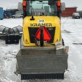 1454809-4 Kompaktlastare Kramer 5040 med skopa, gafflar, vikplog & sandspridare
