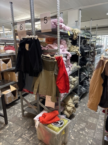 1409511-22 Large batch of stock from clothing store