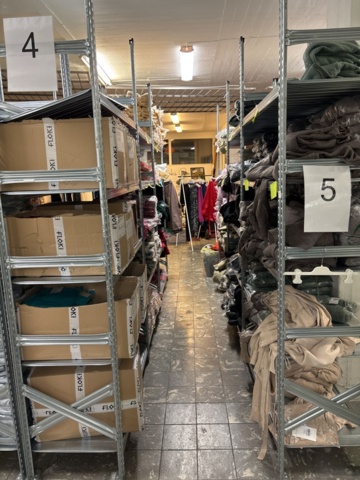 1409511-28 Large batch of stock from clothing store