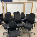 1442499-1 10 office chairs and 1 whiteboard
