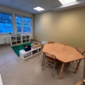 1424075-3 Playroom with furniture and toys - table, chairs, play kitchen, children's armchairs, storage