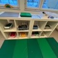 1424075-6 Playroom with furniture and toys - table, chairs, play kitchen, children's armchairs, storage