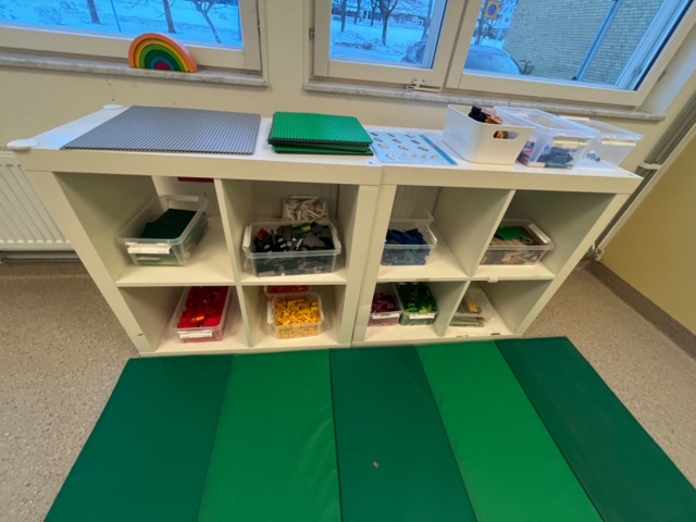 1424075-6 Playroom with furniture and toys - table, chairs, play kitchen, children's armchairs, storage