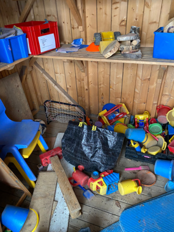 1482006-9 Toys and objects in storage in the yard