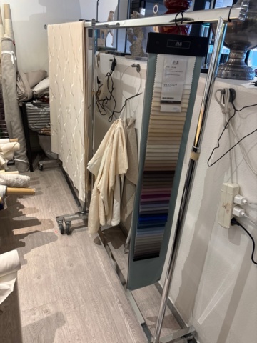 1411005-3 Large work table with various textiles