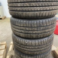 1471221-6 Mixed tires on rims