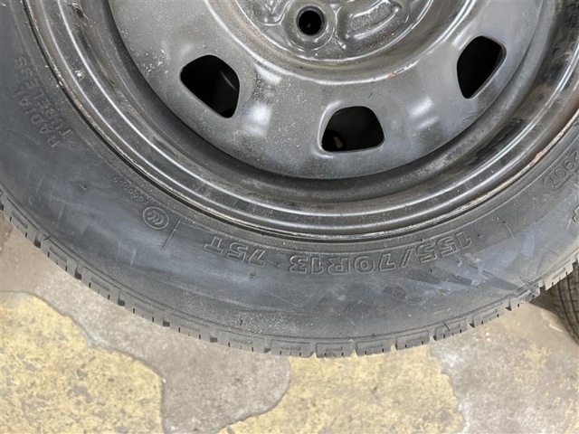 1471221-7 Mixed tires on rims