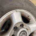 1471221-8 Mixed tires on rims