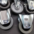 1483181-2 Castors, 10 pcs – grey rubber wheels, swivel, flat mount
