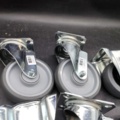 1483181-4 Castors, 10 pcs – grey rubber wheels, swivel, flat mount