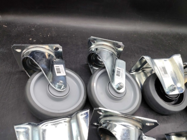 1483181-4 Castors, 10 pcs – grey rubber wheels, swivel, flat mount