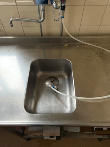 1486664-4 Stainless steel bench with sink and base cabinet