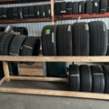 1469586-6 Various used tires, approximately 200 pieces - including shelves and pallet racks