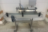 1470257 Semi-automatic filling machine with conveyor belt