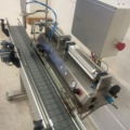 1470257-3 Semi-automatic filling machine with conveyor belt