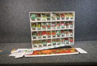 1493426 Retail rack with Nelson Garden seed bags of tomato seeds