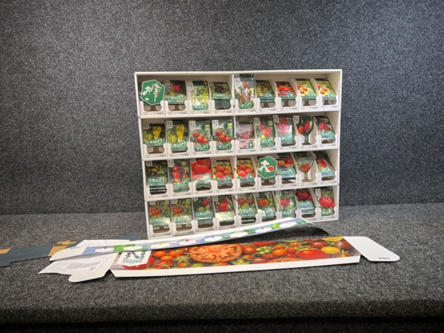 1493426-1 Retail rack with Nelson Garden seed bags of tomato seeds