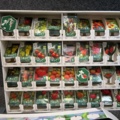 1493426-2 Retail rack with Nelson Garden seed bags of tomato seeds
