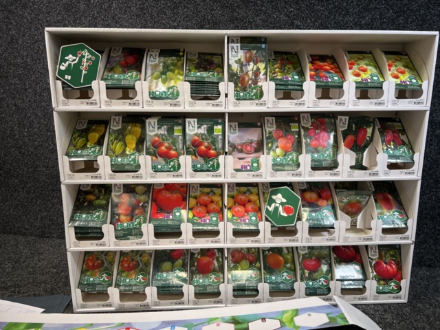 1493426-2 Retail rack with Nelson Garden seed bags of tomato seeds