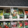 1493426-4 Retail rack with Nelson Garden seed bags of tomato seeds