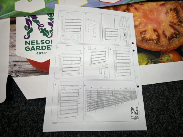 1493426-14 Retail rack with Nelson Garden seed bags of tomato seeds