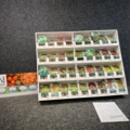 1493427-1 Retail rack with Nelson Garden seed bags of tomato seeds