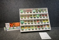 1493427 Retail rack with Nelson Garden seed bags of tomato seeds