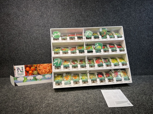 1493427-1 Retail rack with Nelson Garden seed bags of tomato seeds