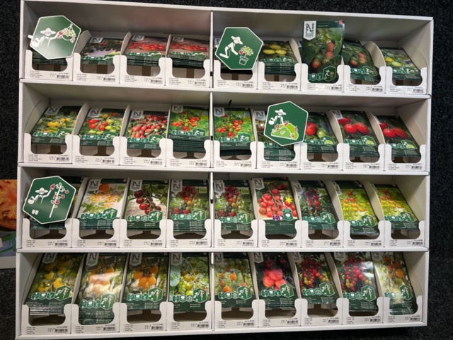 1493427-2 Retail rack with Nelson Garden seed bags of tomato seeds