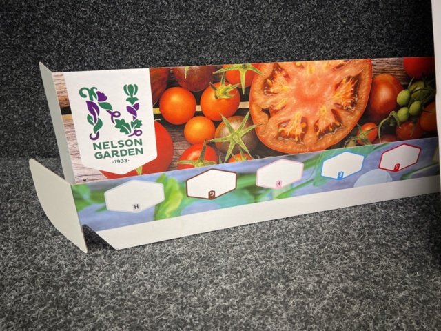 1493427-13 Retail rack with Nelson Garden seed bags of tomato seeds