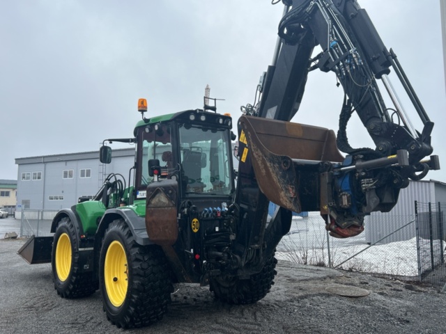 1503916-3 Traktorgrävare Huddig 1260C med tiltrotator + redskap